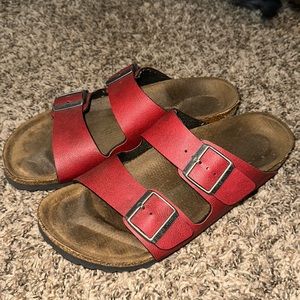 Red 2 strap Birkenstocks, lightly worn. Amazing condition